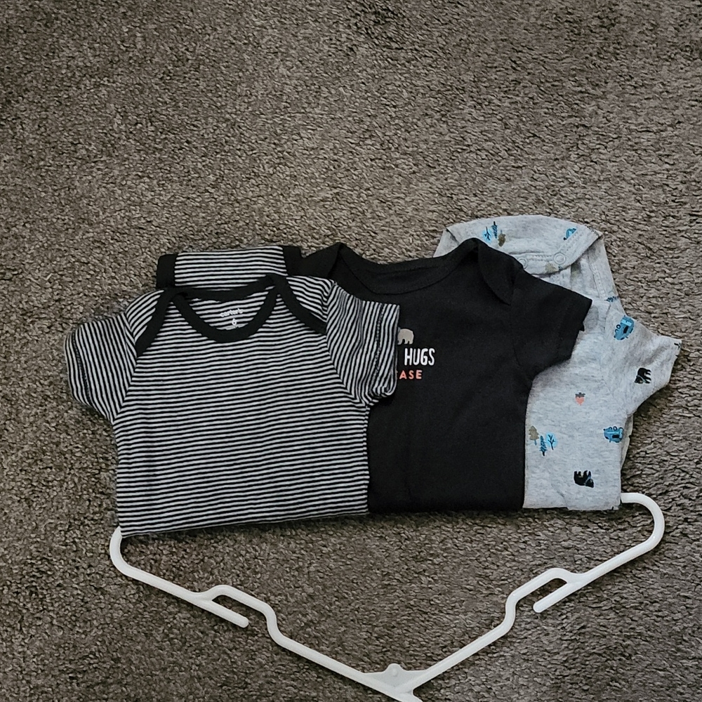 3 Carters Onesies size 6 months.